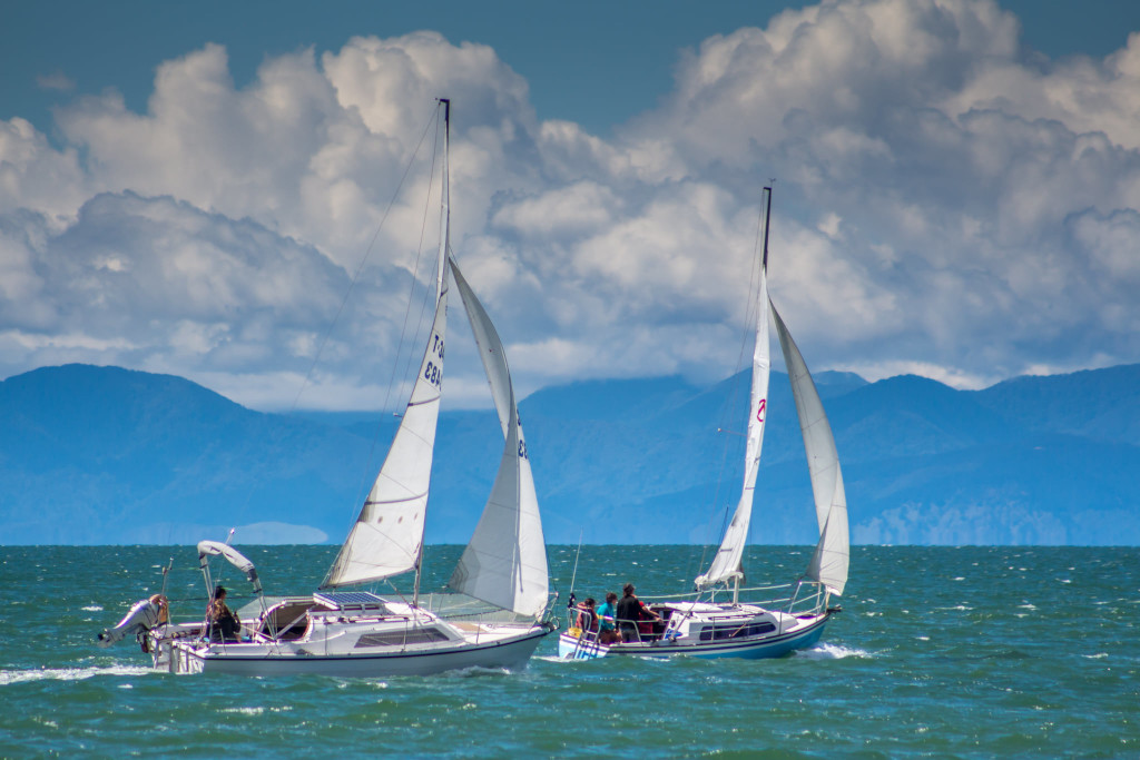 two sailing boats racing
